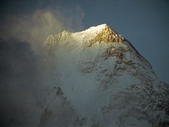 12 Gasherbrum IV Close Up At Sunset From Concordia The clouds covering the summit of Gasherbrum IV cleared a bit to reveal the summit ridge at sunset seen from Concordia.